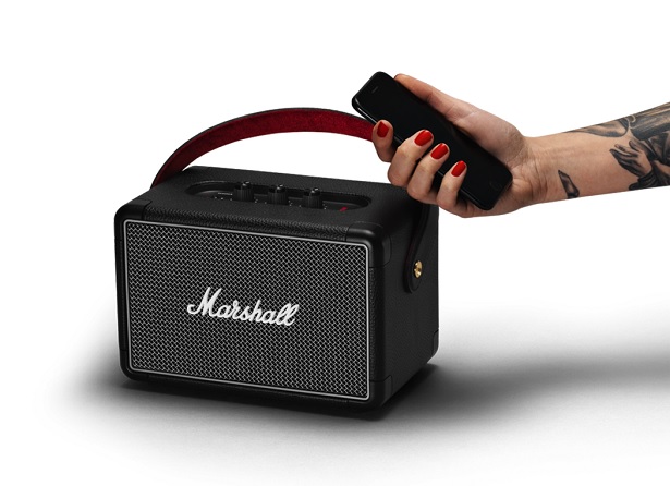 hand holding phone with speaker