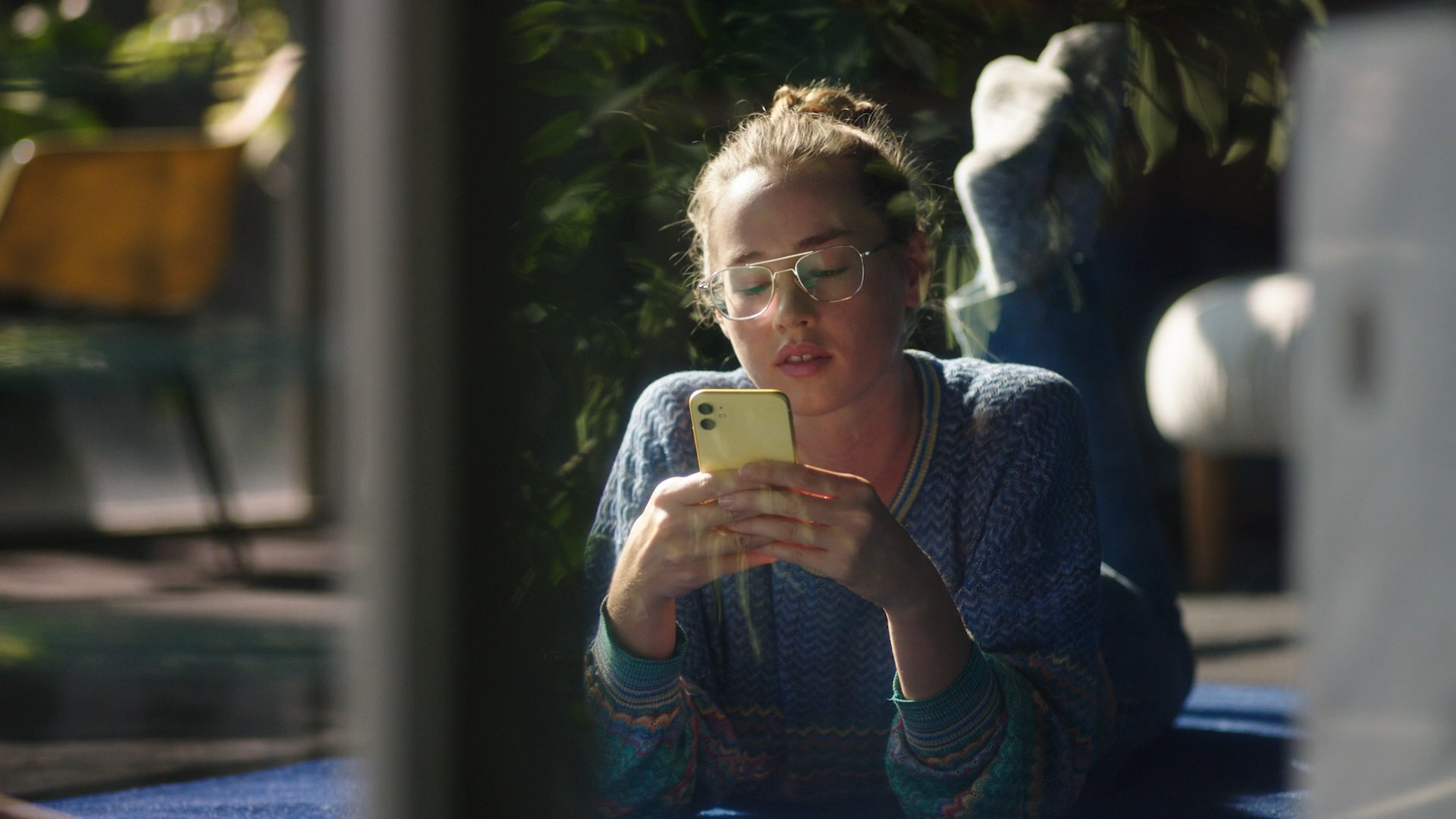 young woman using iphone young woman using iphone