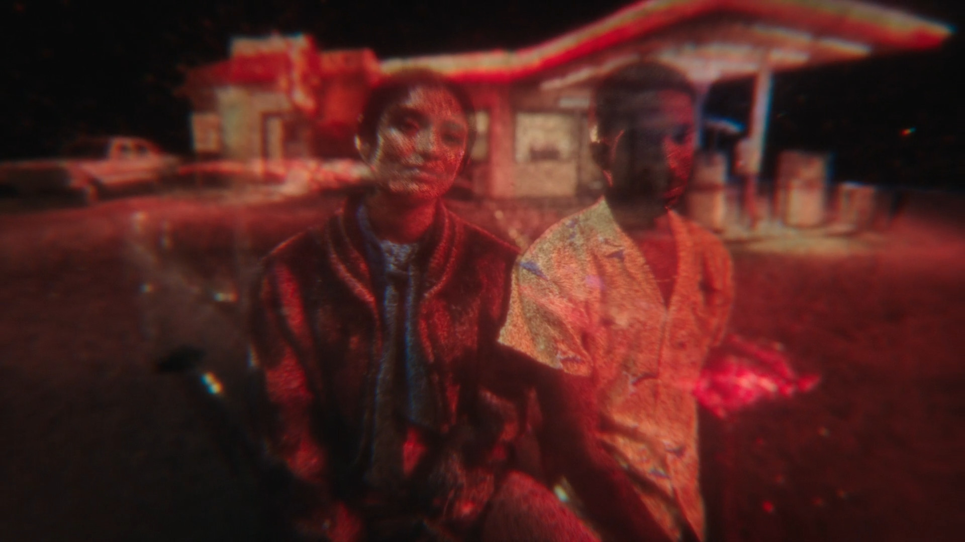 people in front of gas station