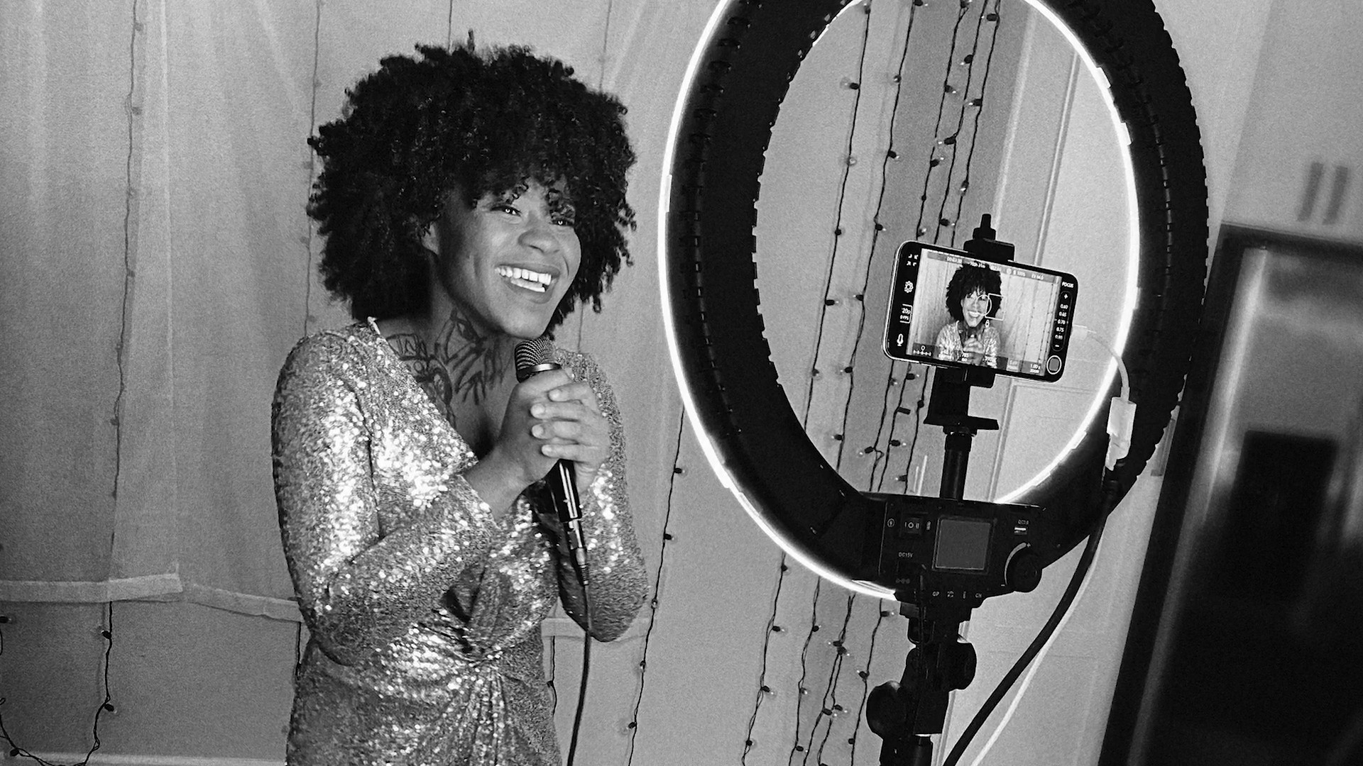 singer with ring light