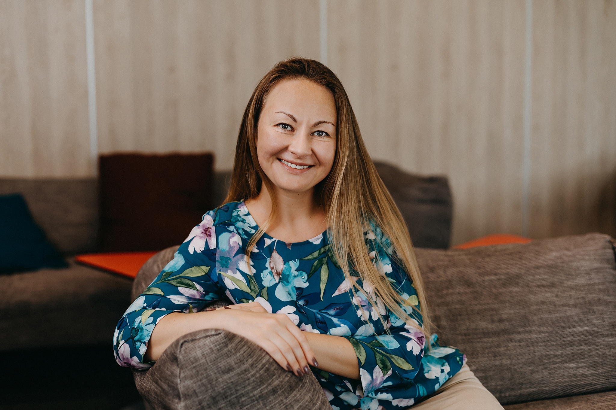 smiling woman on couch