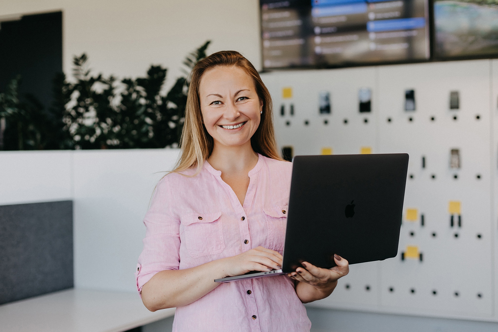 woman with laptop in office