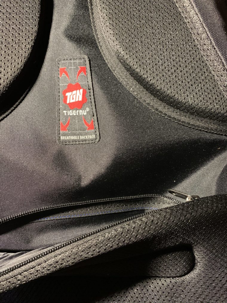 black backpack interior tag