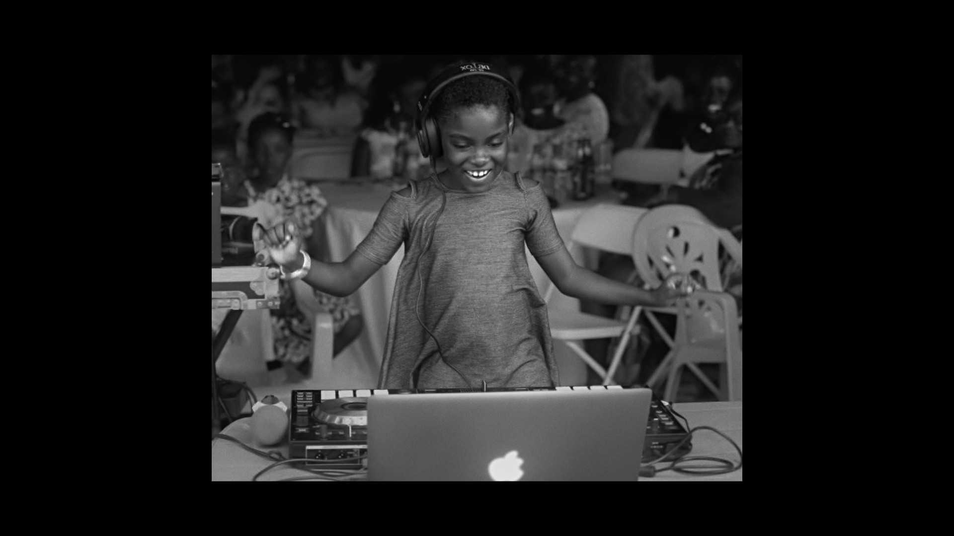 child dj with laptop