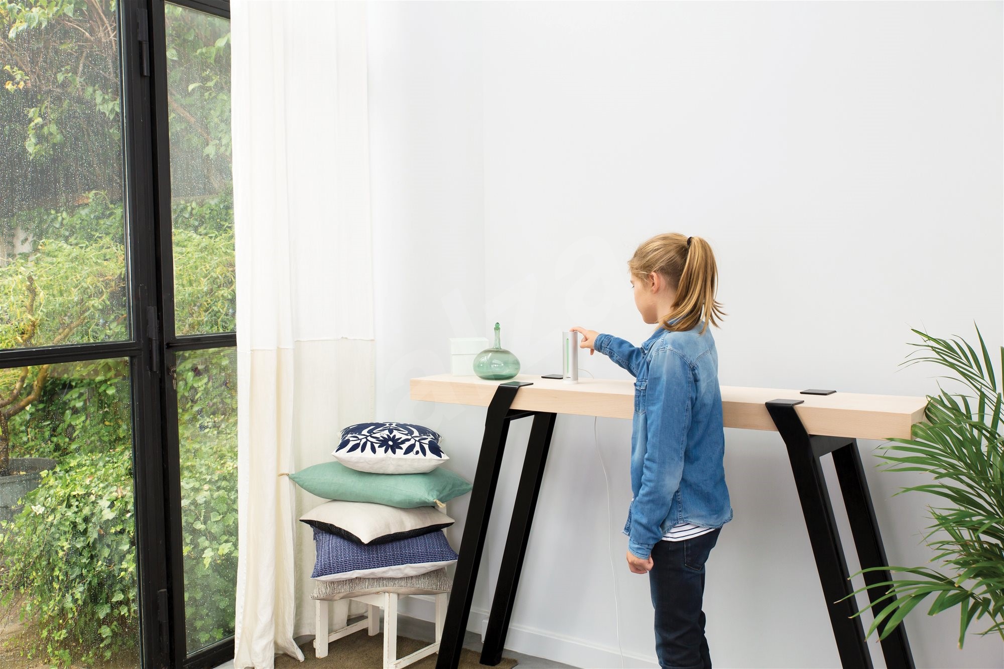 child interacting with device