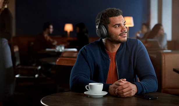 man in cafe with headphones