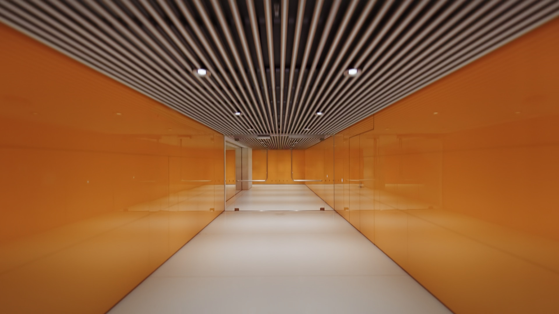 orange hallway with striped ceiling