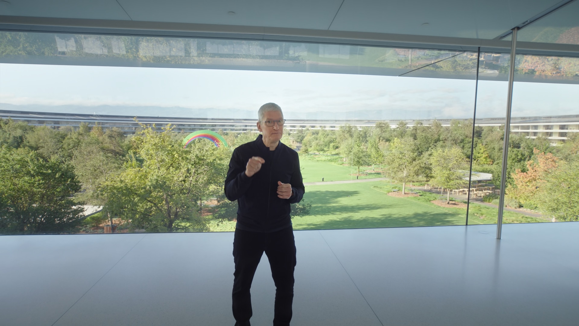 person gesturing in modern office