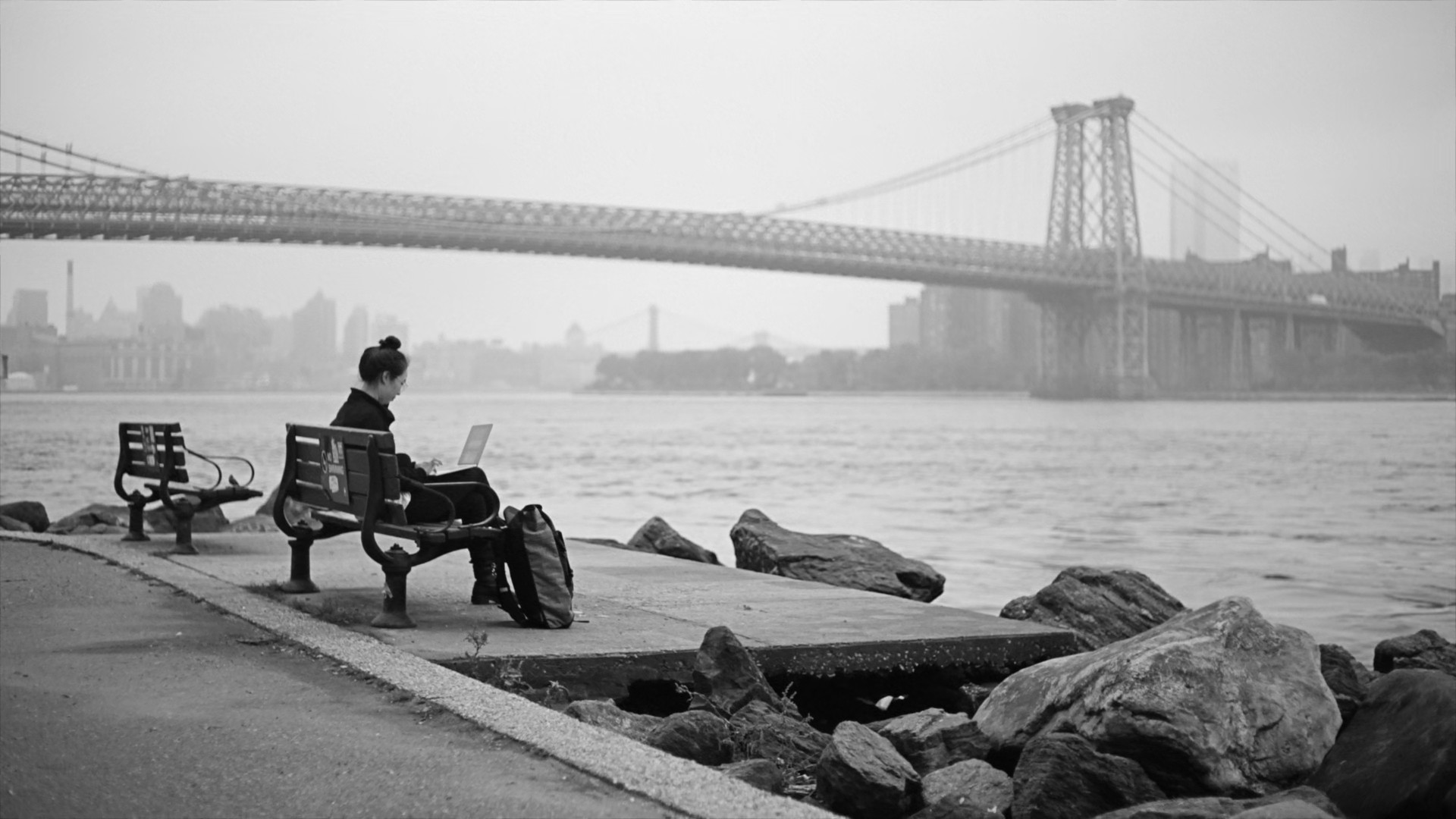 person working by river