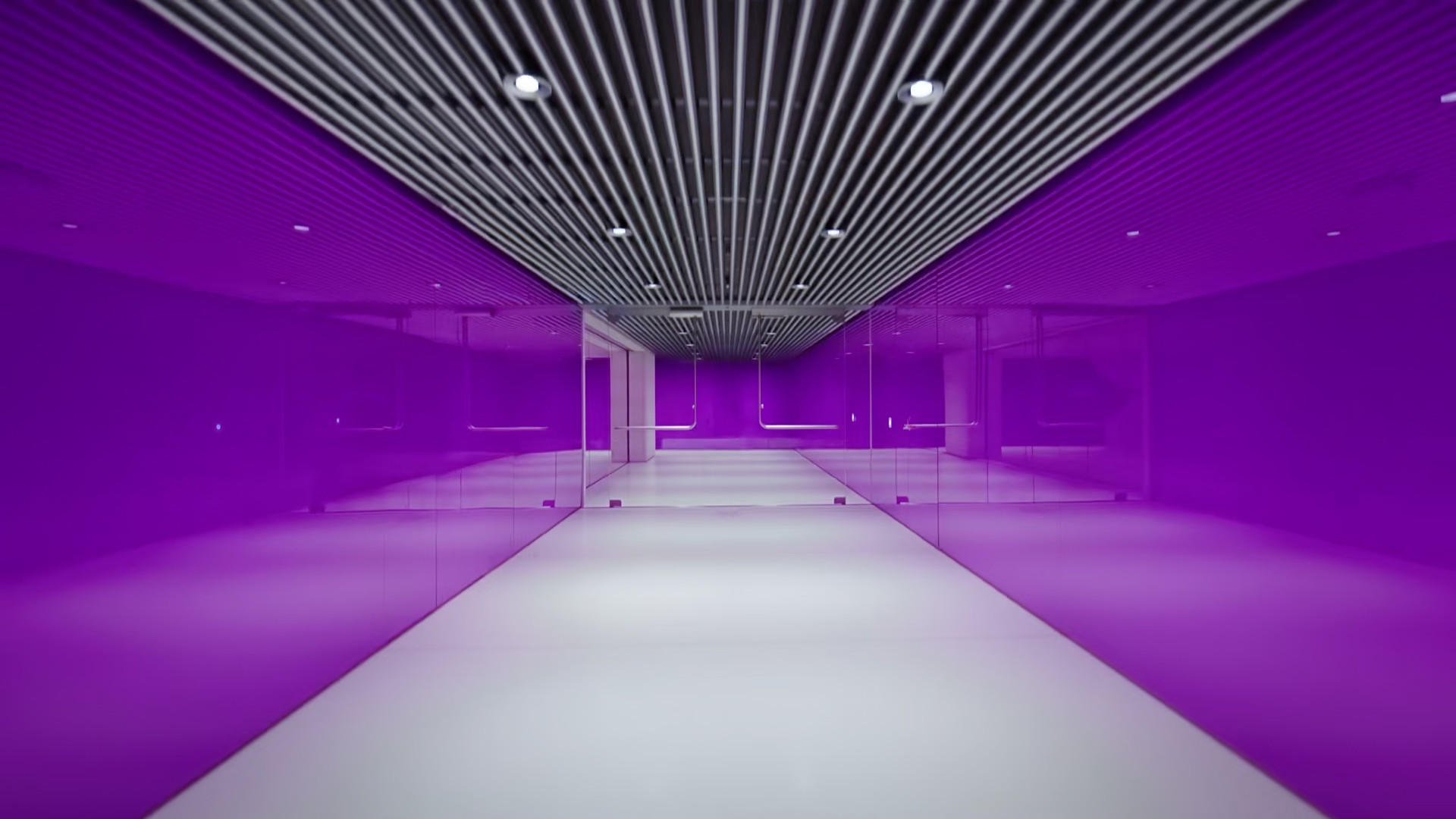 purple hallway with striped ceiling