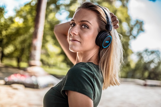 woman wearing headphones outdoors