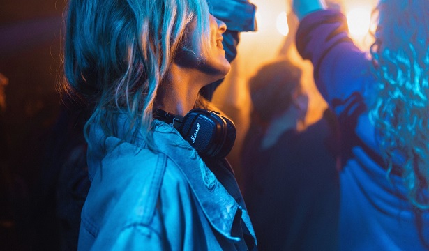 woman wearing headphones party