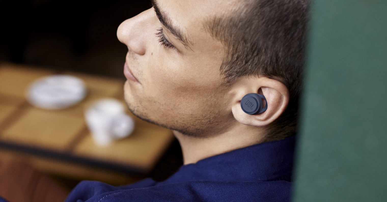 man wearing wireless earbuds