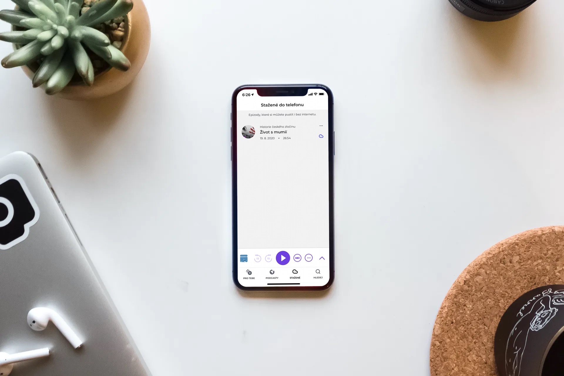smartphone on desk with plants
