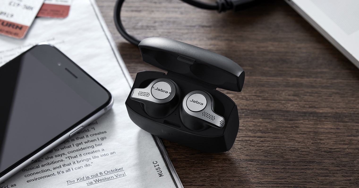 wireless earbuds on desk
