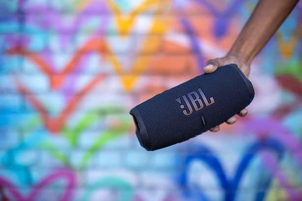 hand holding jbl speaker