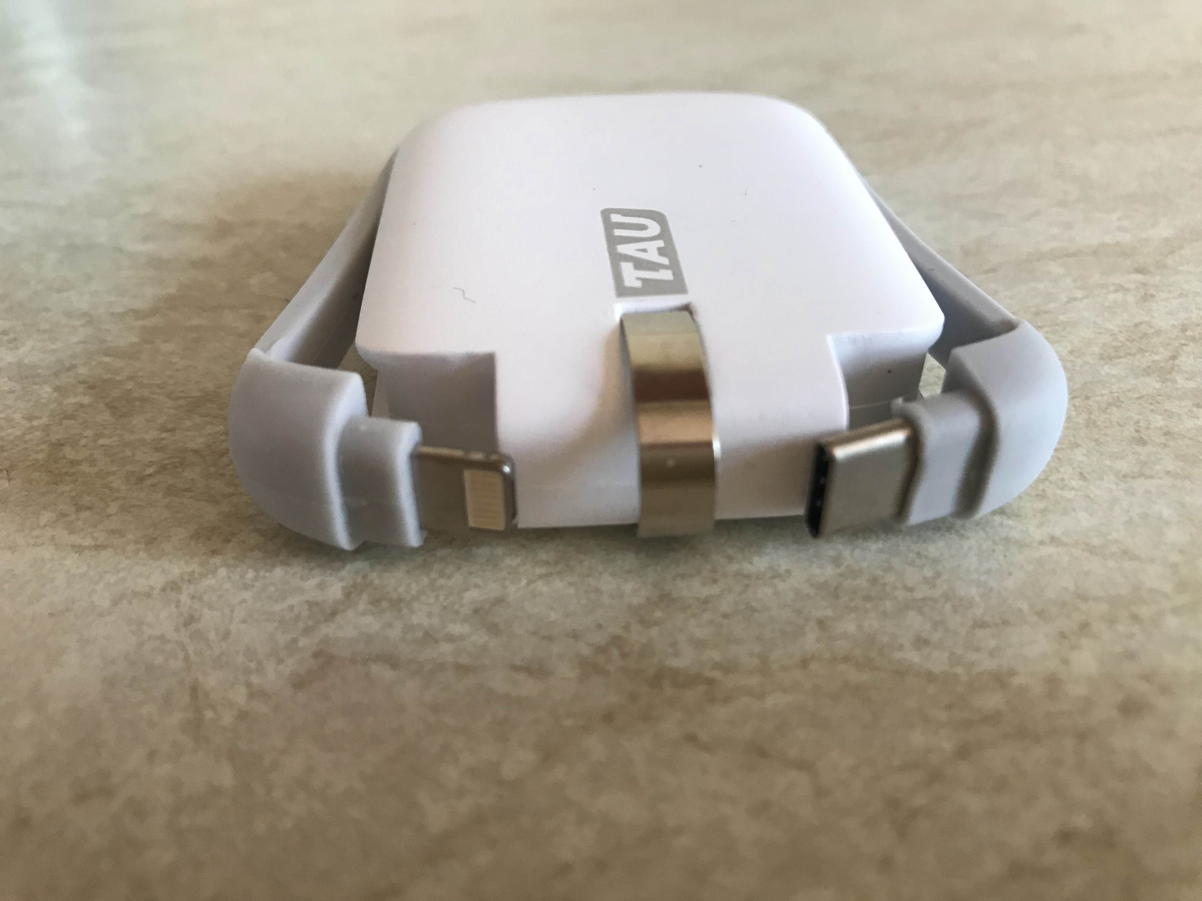 tau power bank with cables