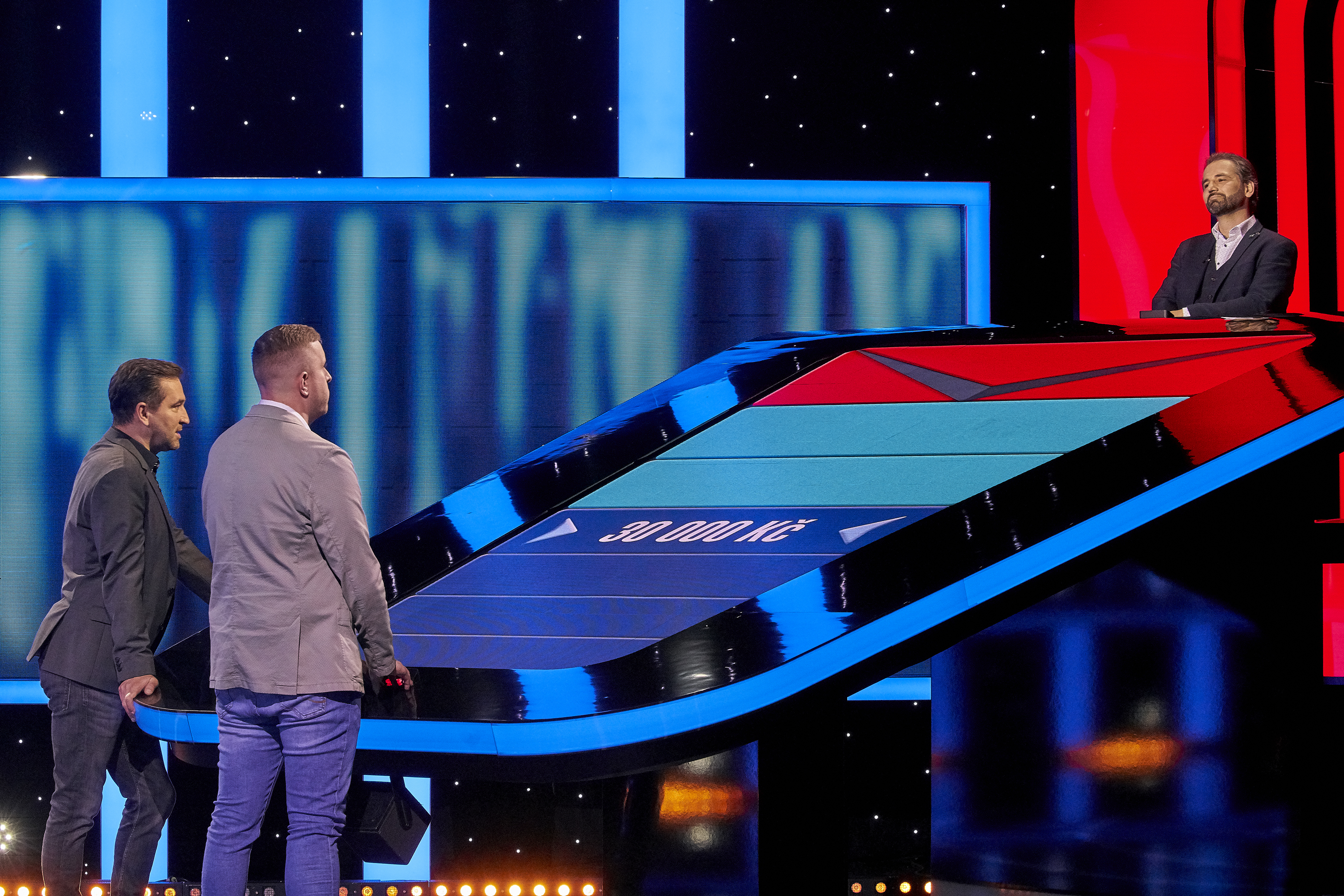 game show contestants and host