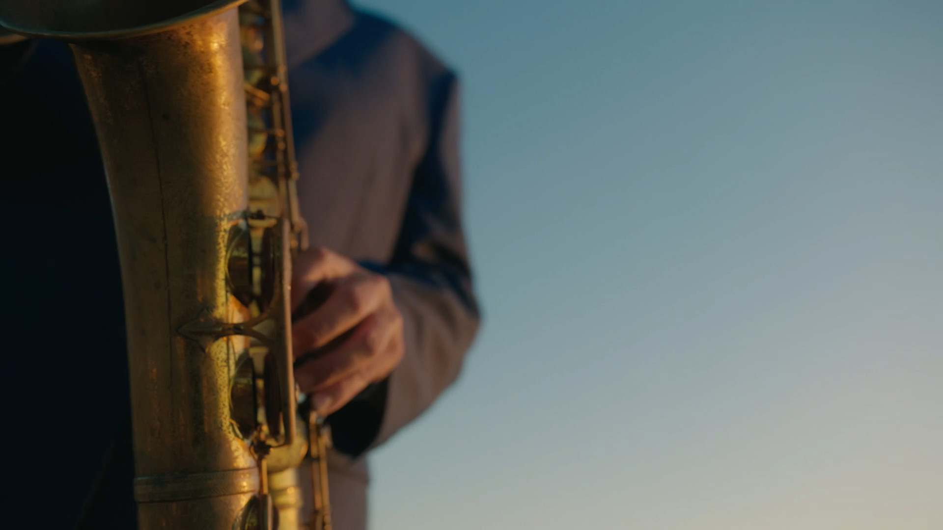 closeup saxophone player