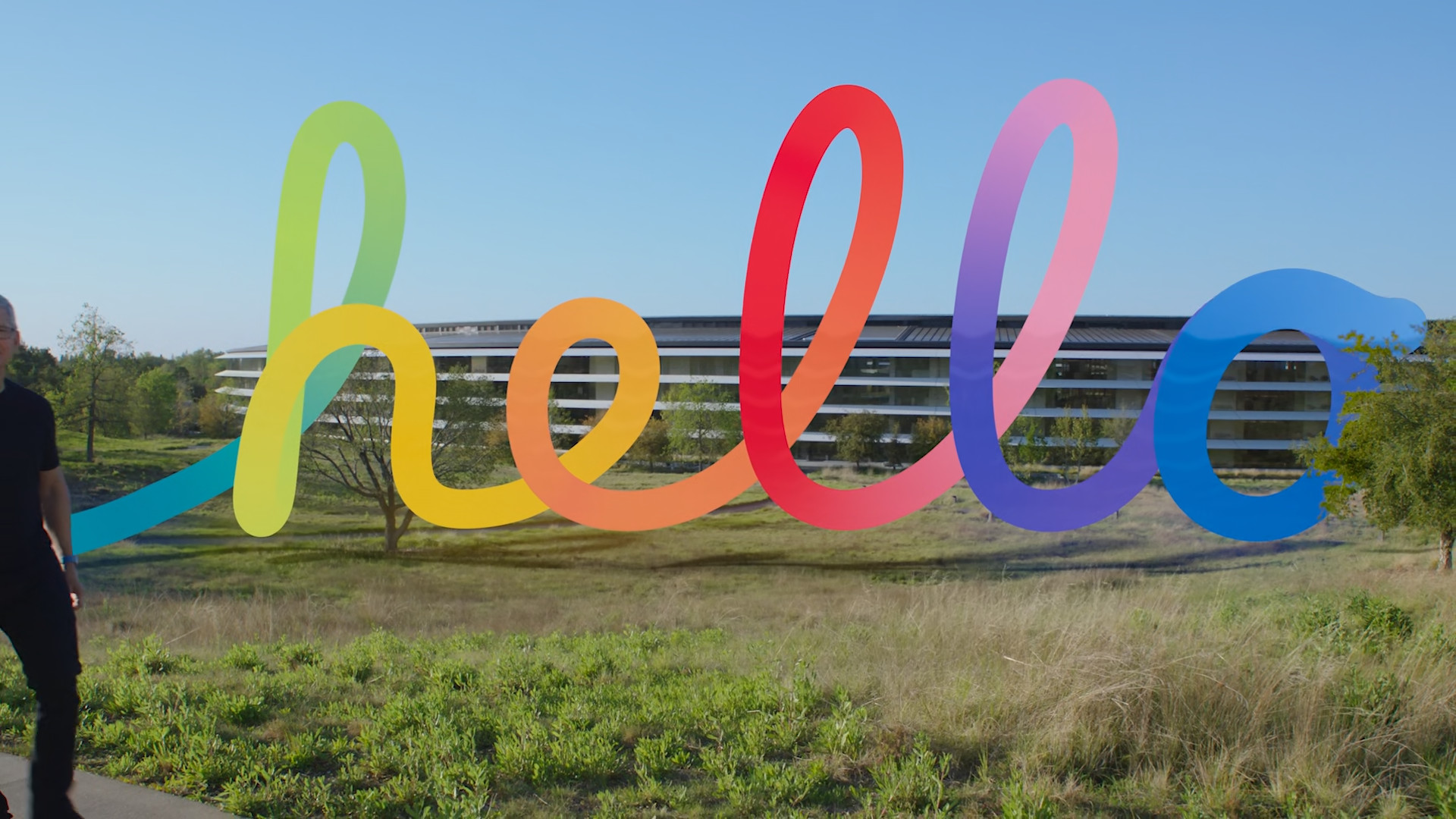 colorful hello sign in front of building