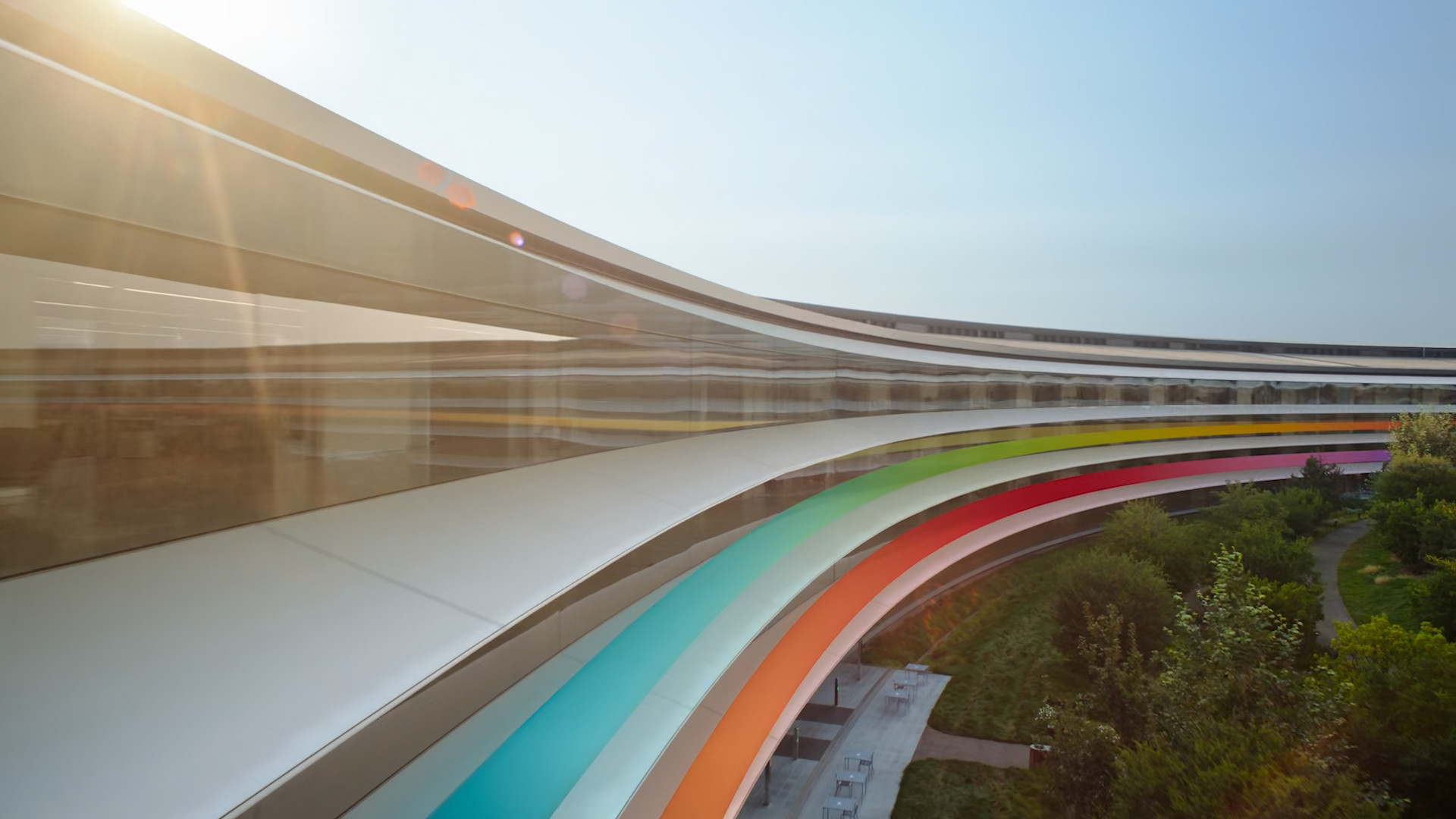 curved building with colorful stripes