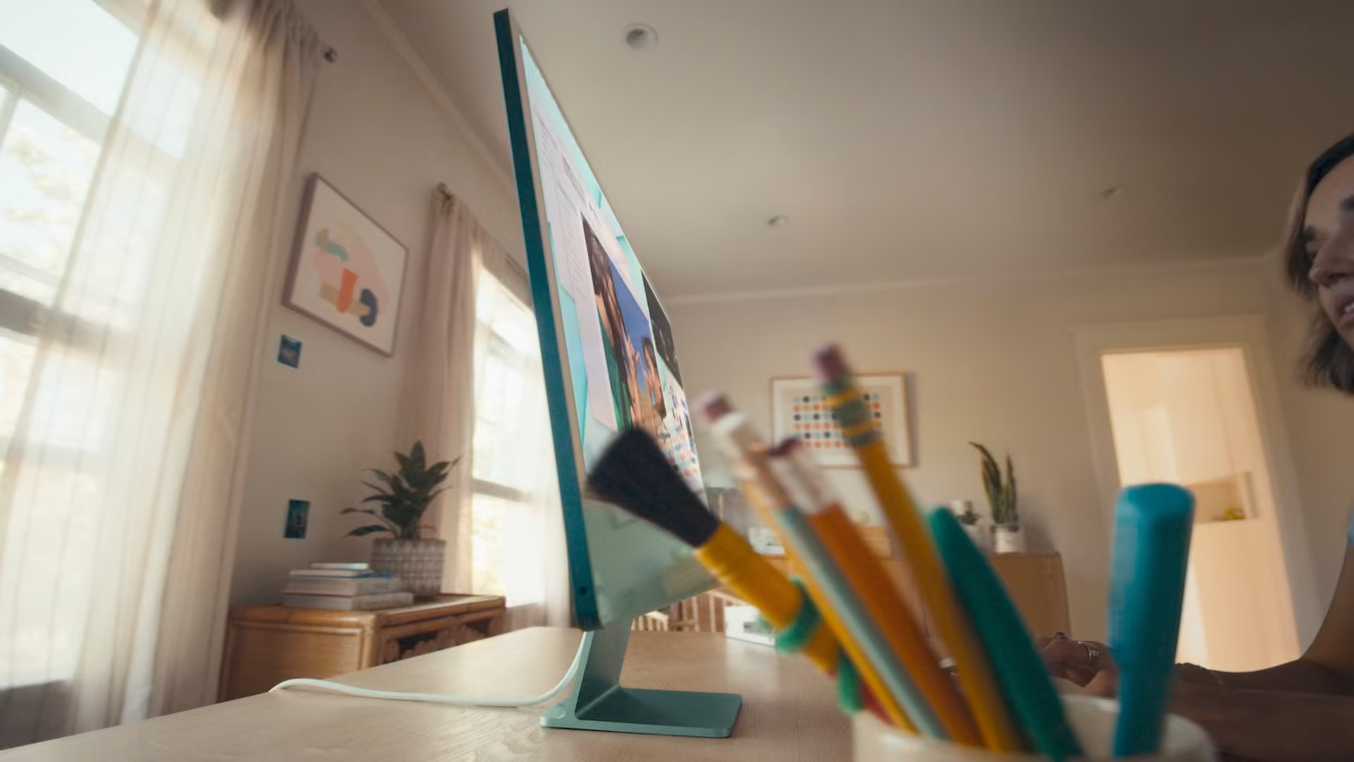 desktop monitor with pencils