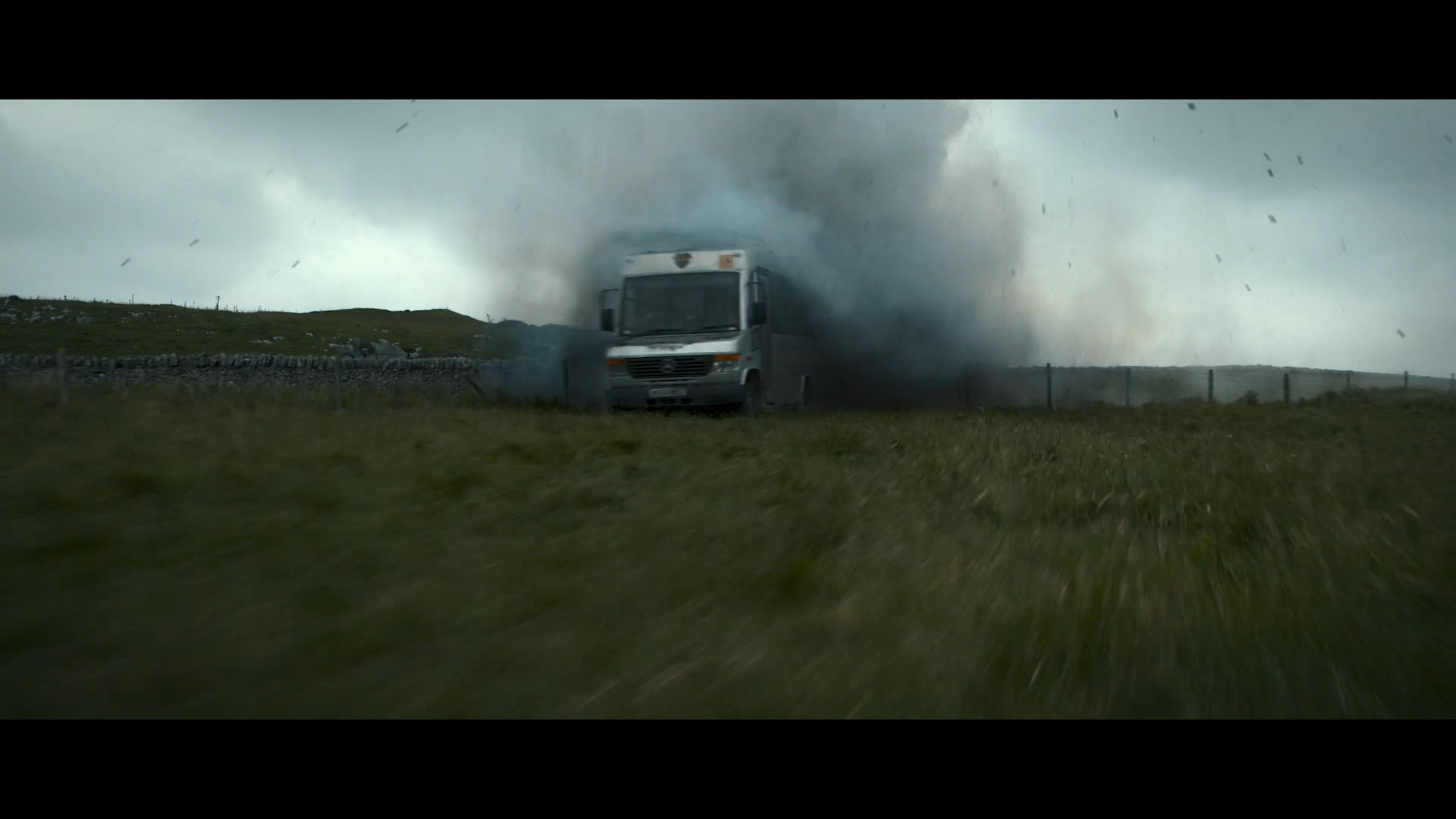 exploding vehicle in field