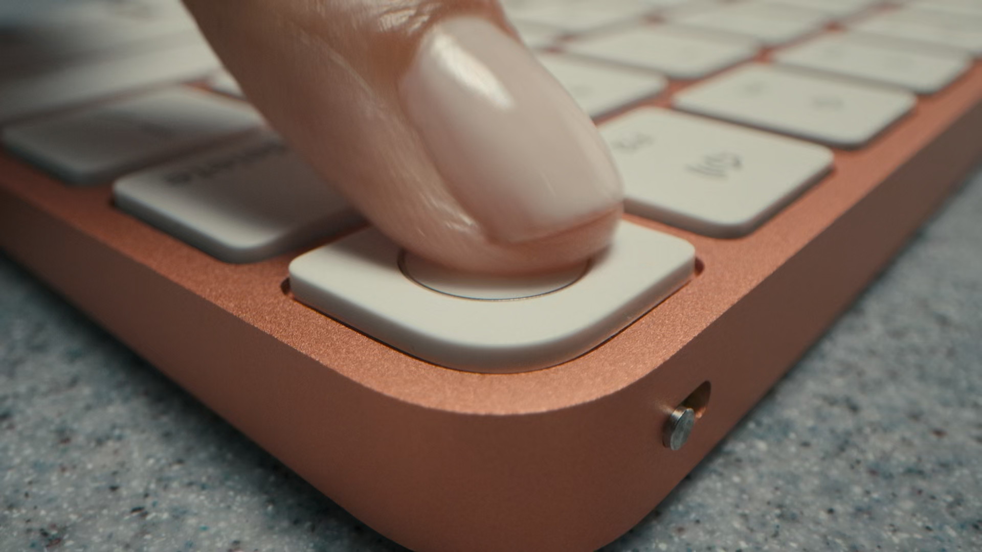 finger pressing keyboard button