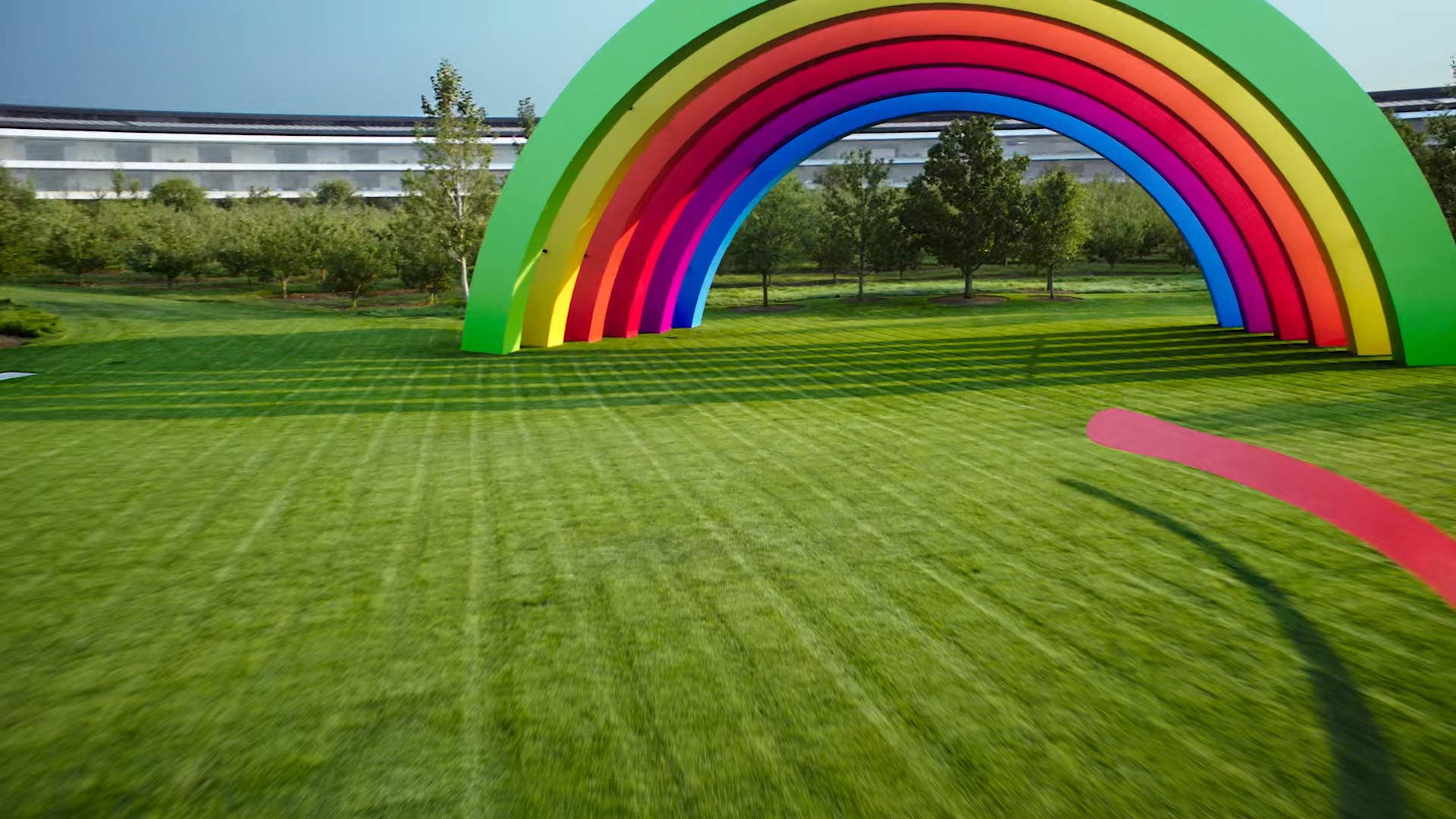 green lawn with rainbow arch