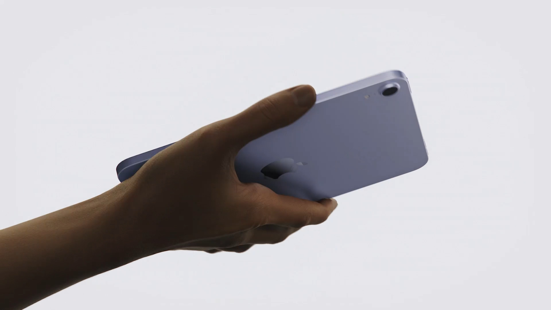 hand holding tablet side