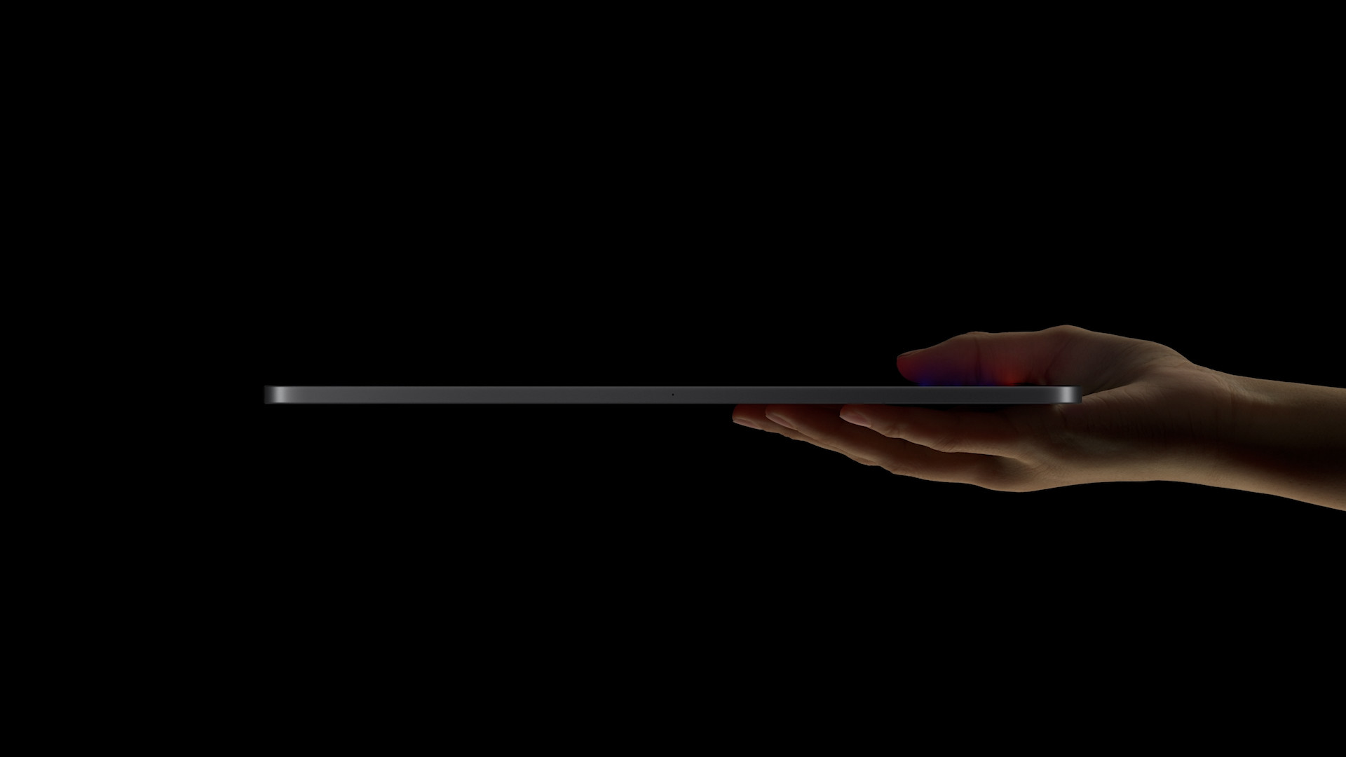 hand holding thin device