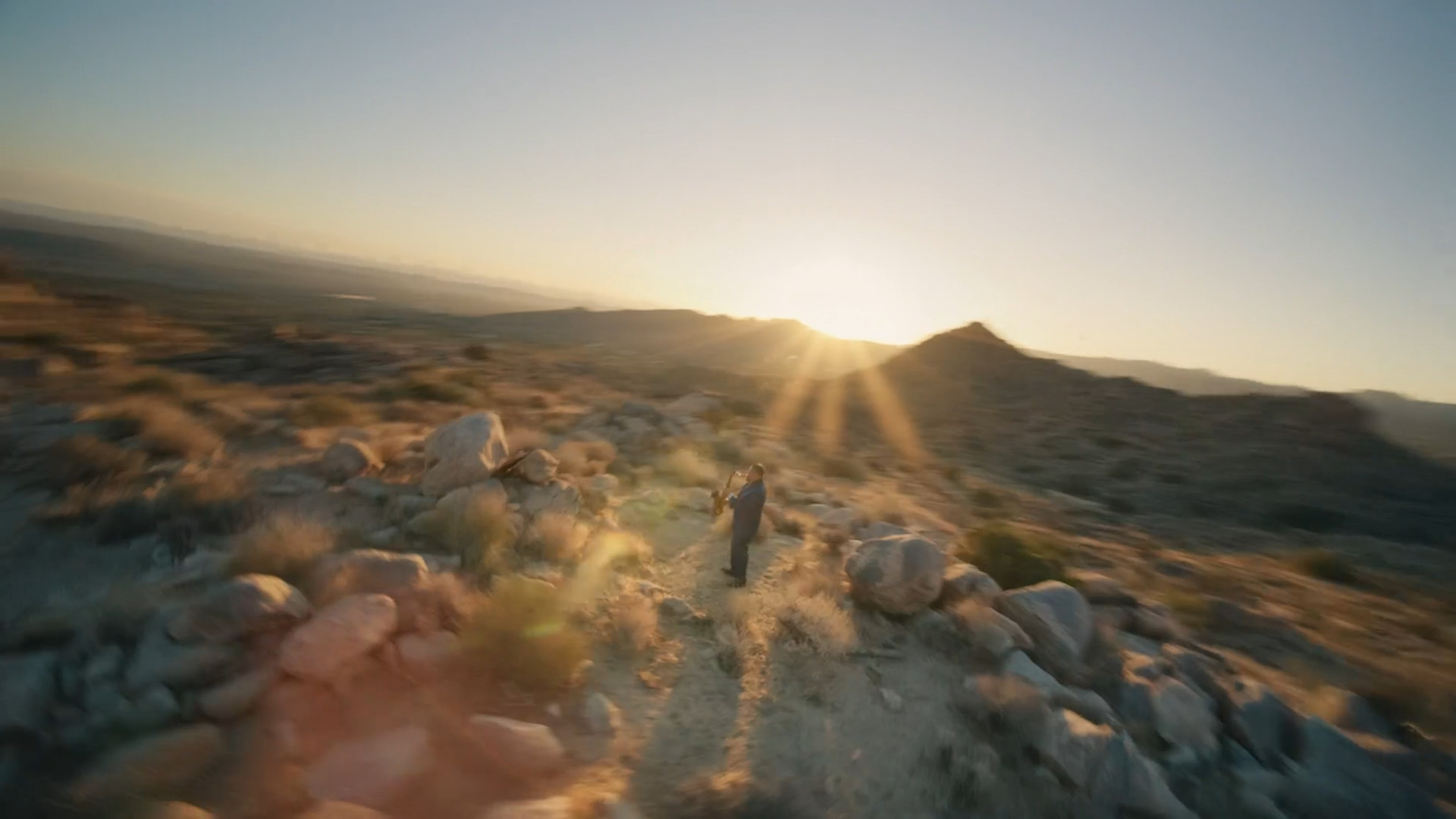 hiker rocky trail sunset