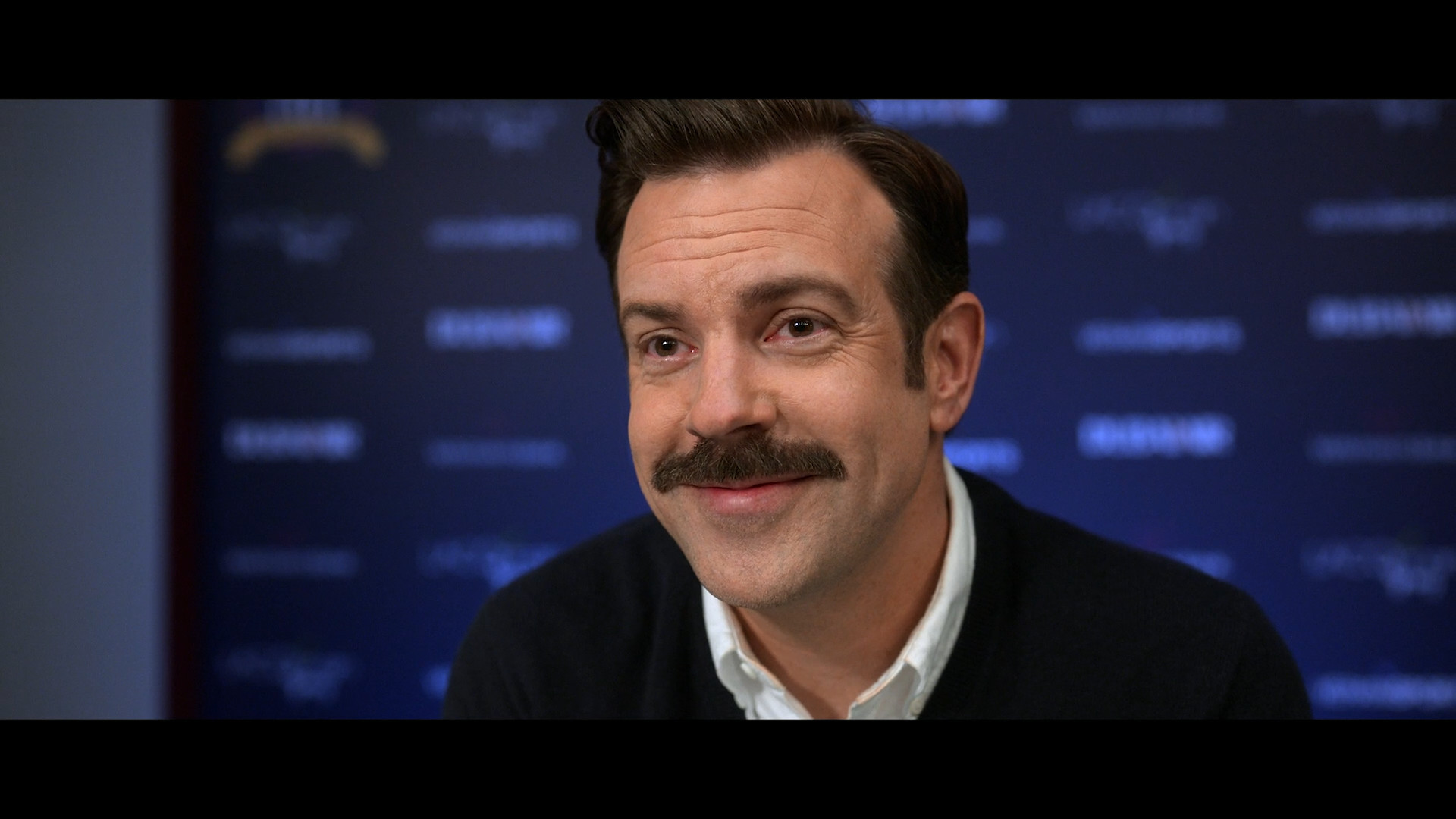 man smiling interview