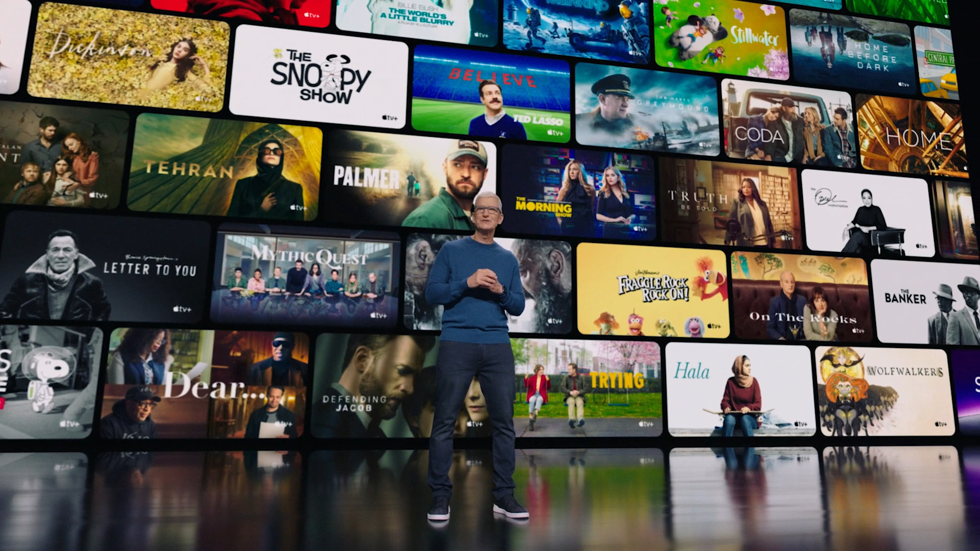 person in front of tv show wall