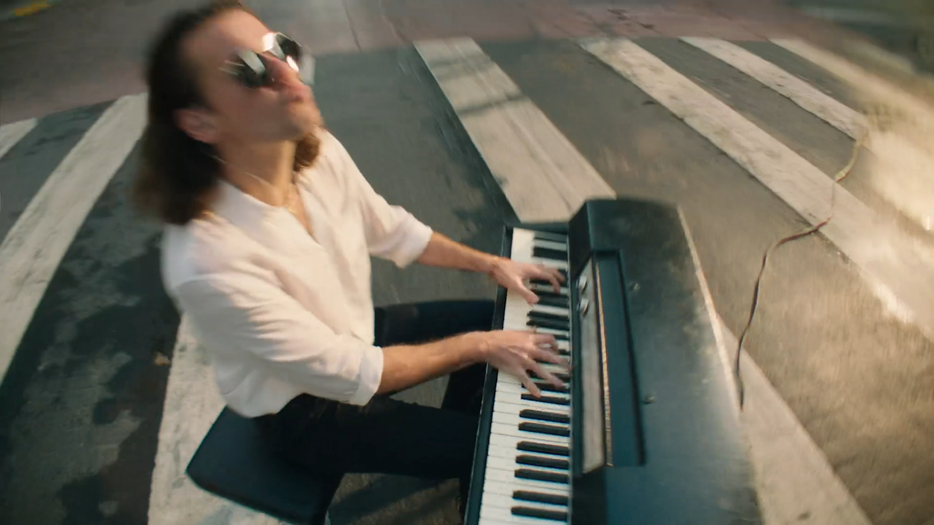 pianist on crosswalk
