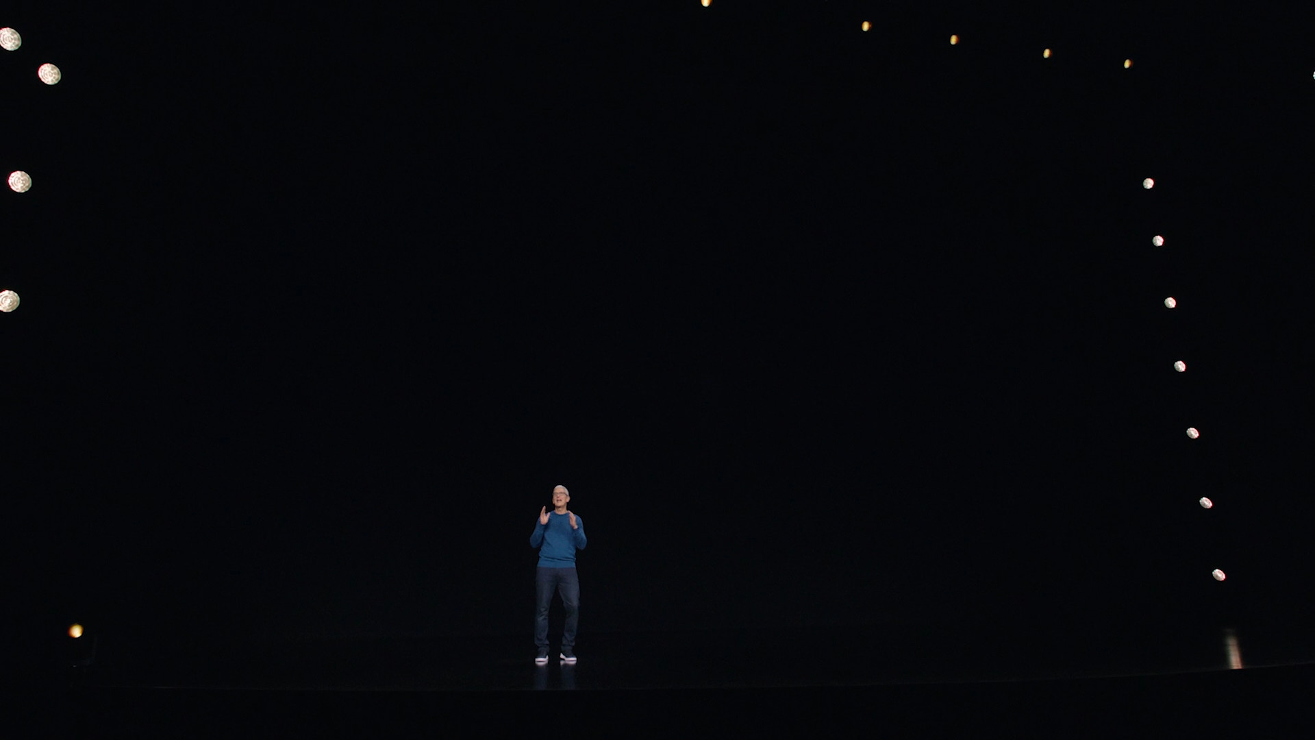 speaker on dark stage