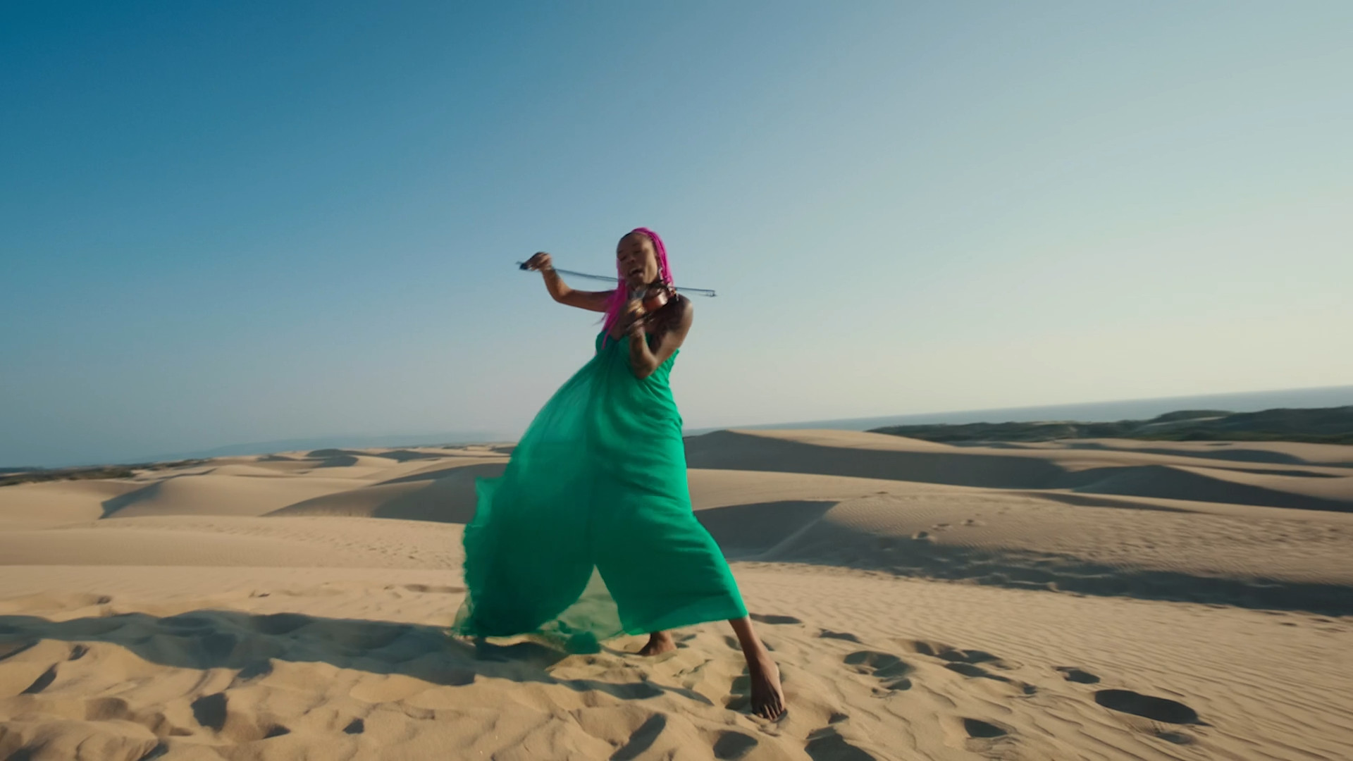 violinist desert dunes