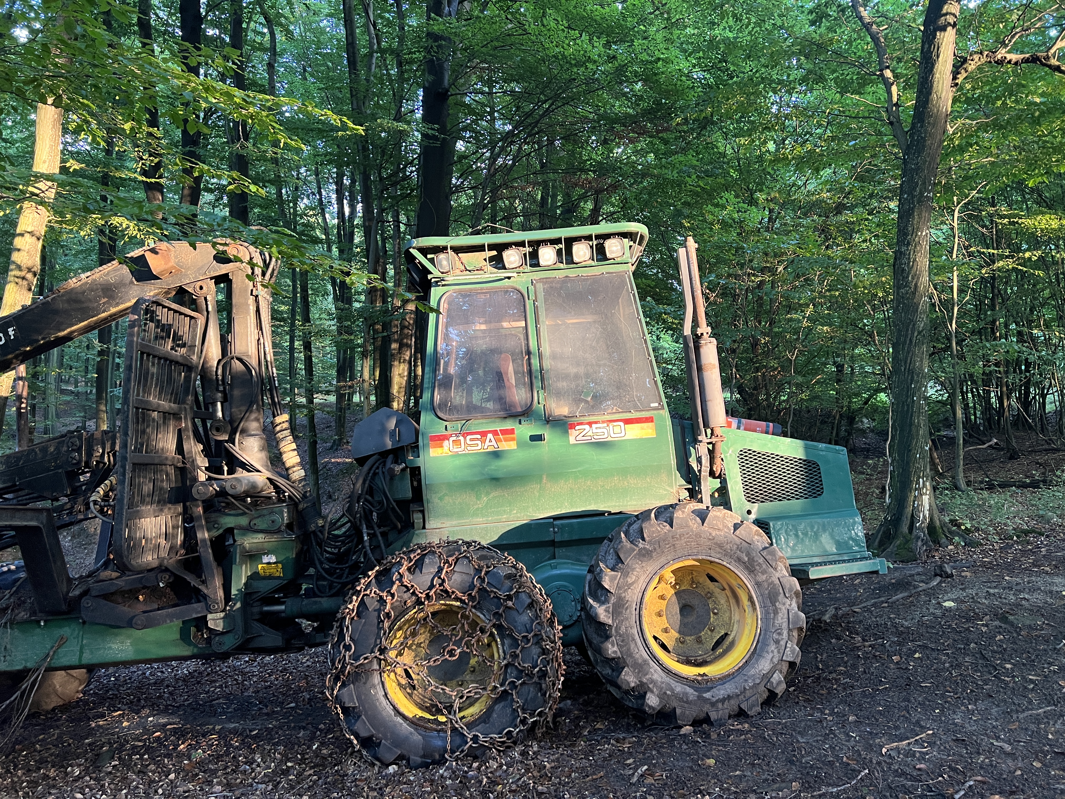 green tractor in forest