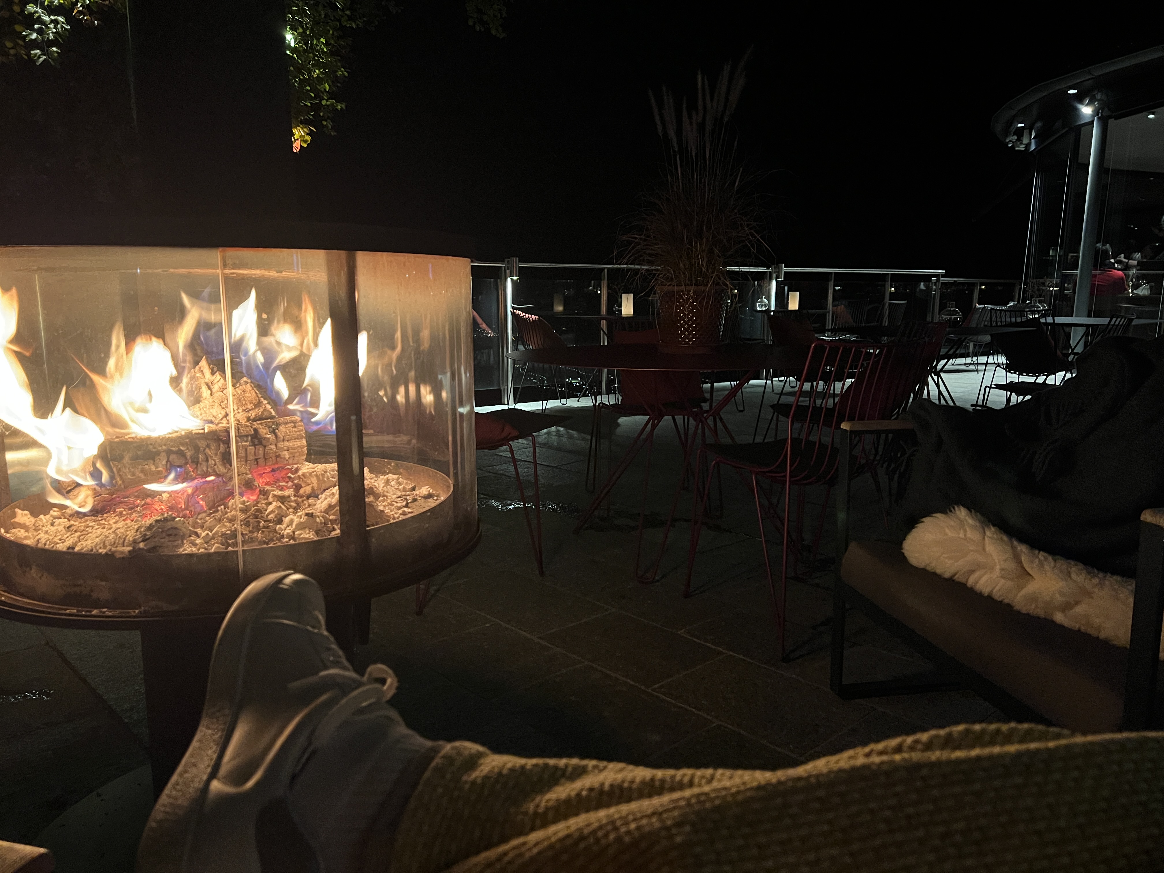 cozy outdoor fireplace night
