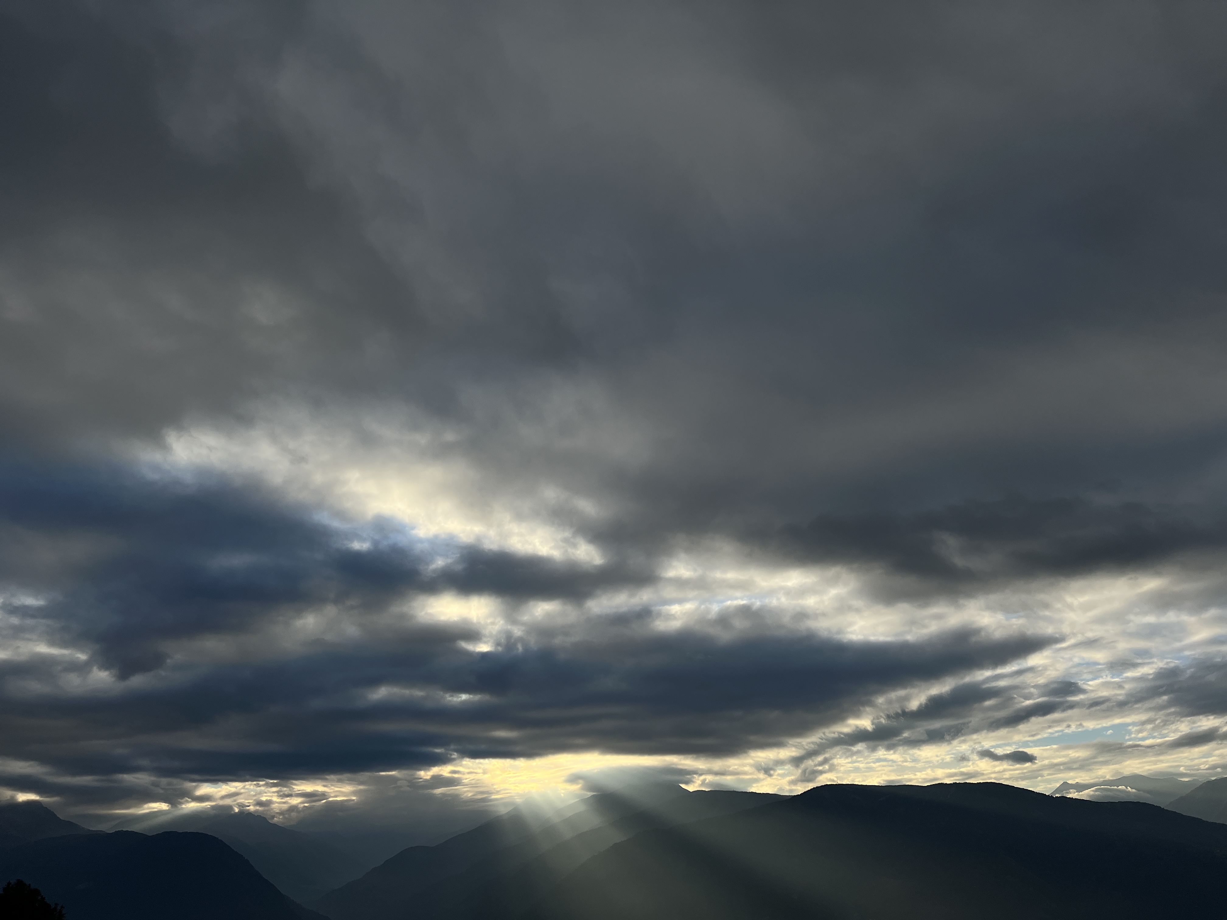 dramatic clouds over mountain range