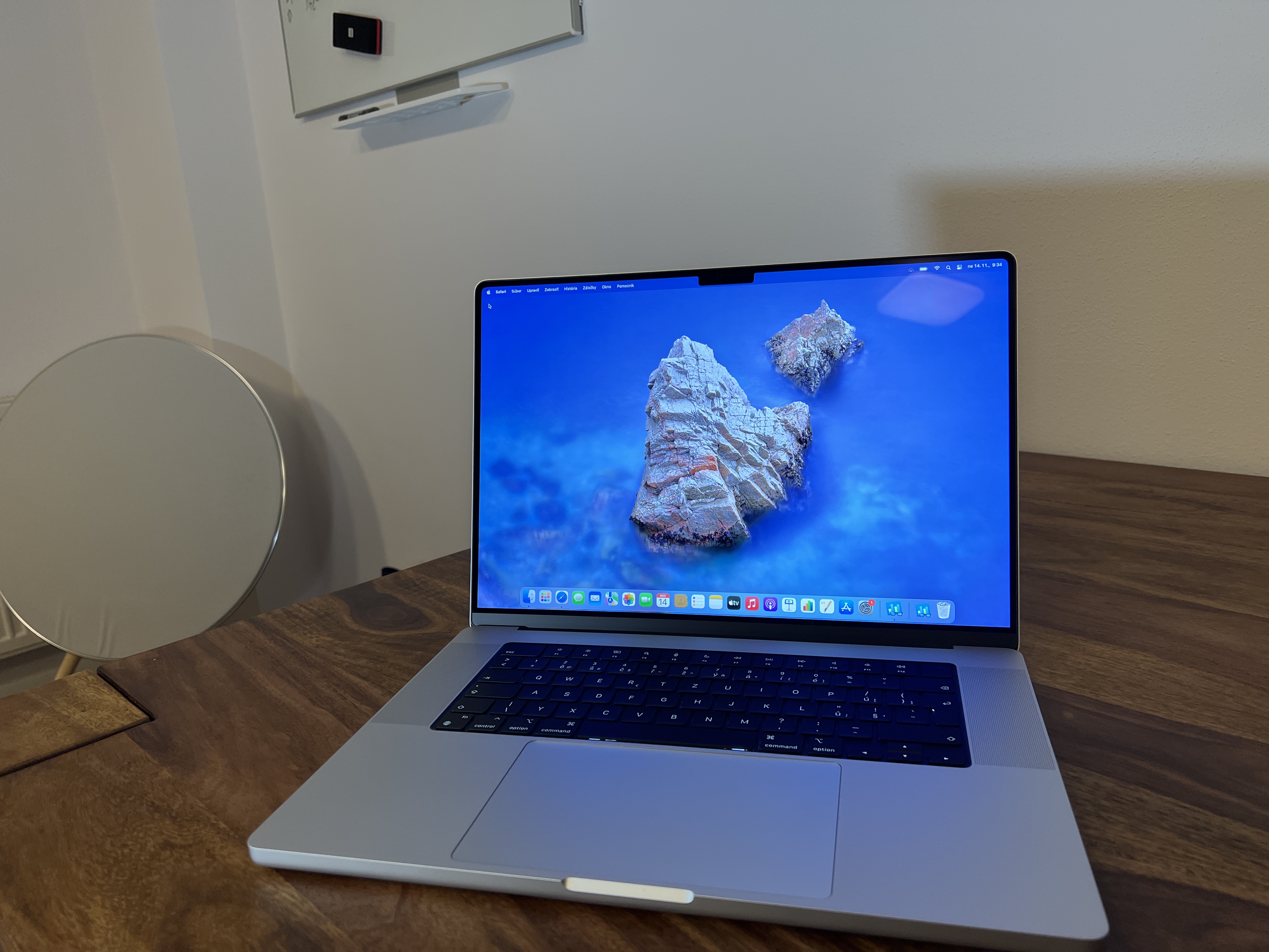 laptop on wooden desk