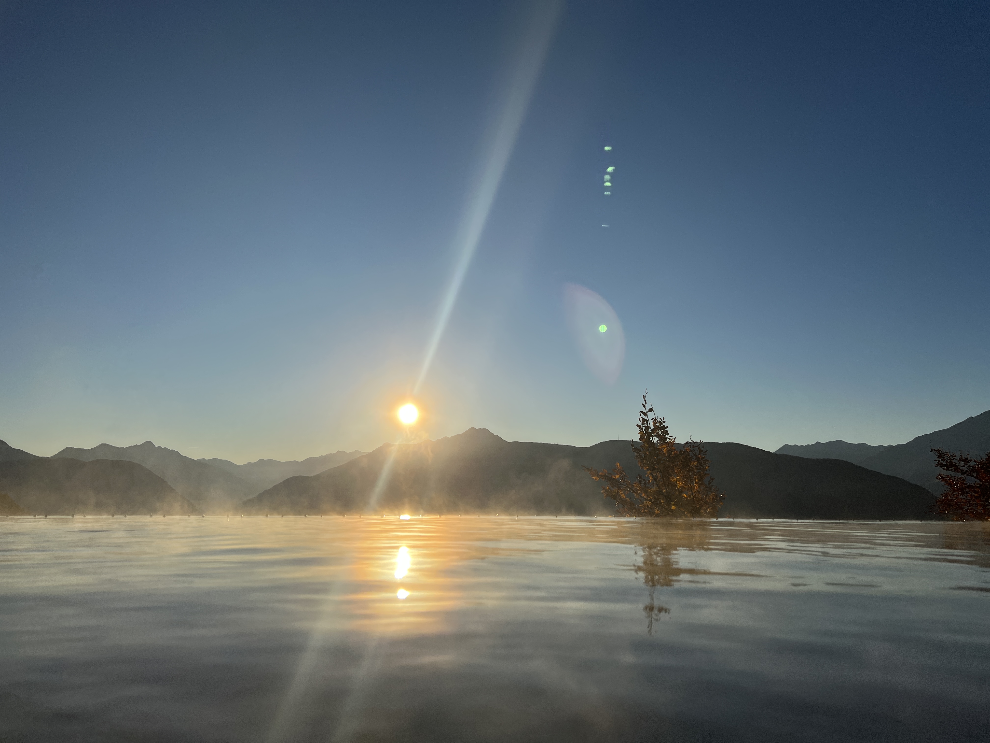 sunrise over mountain lake