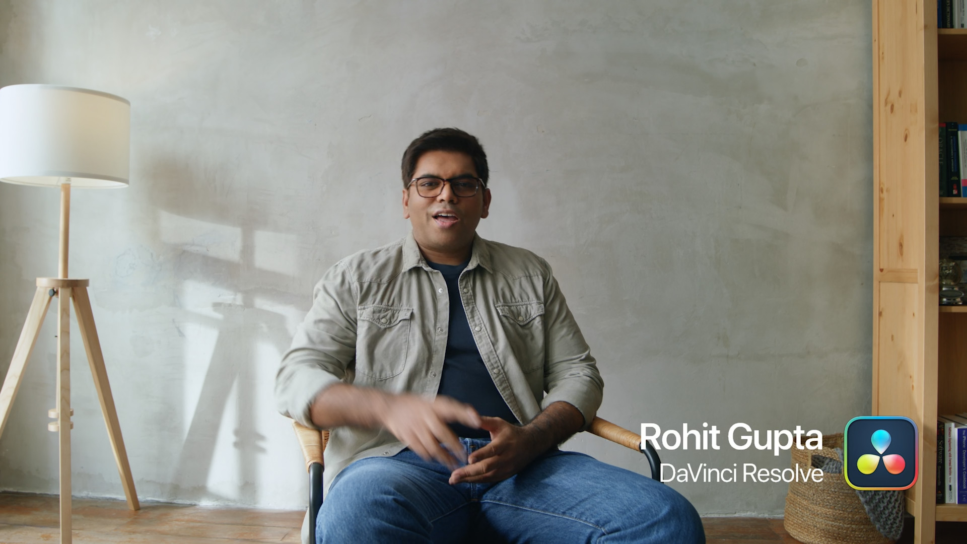 man sitting chair lamp