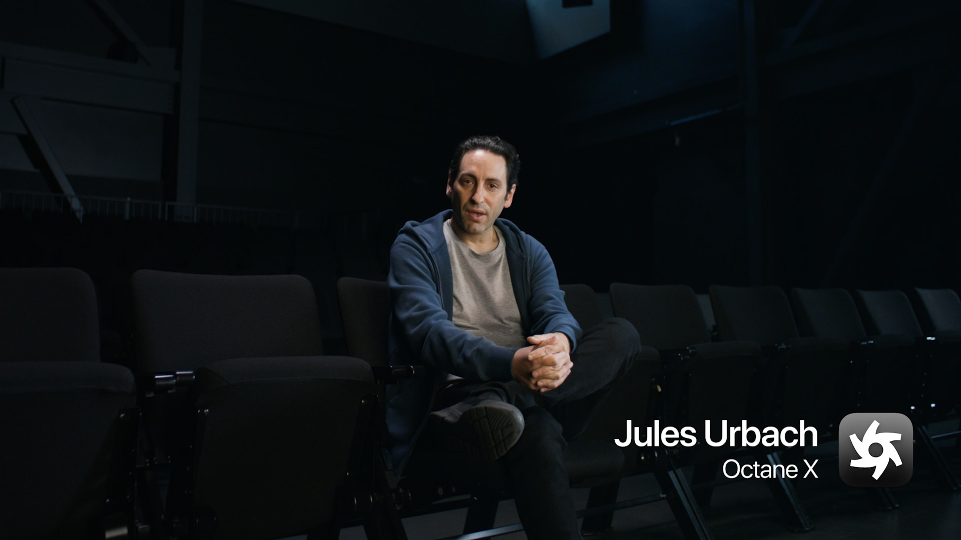 man sitting theater seats