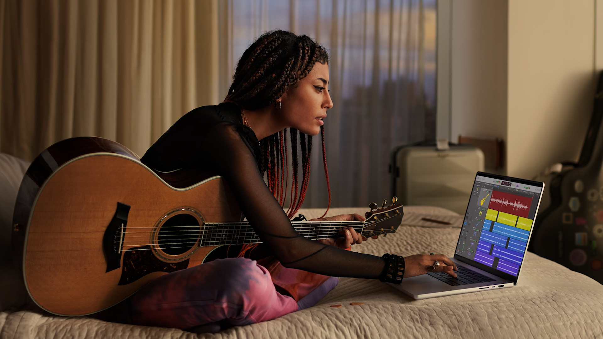 musician using laptop