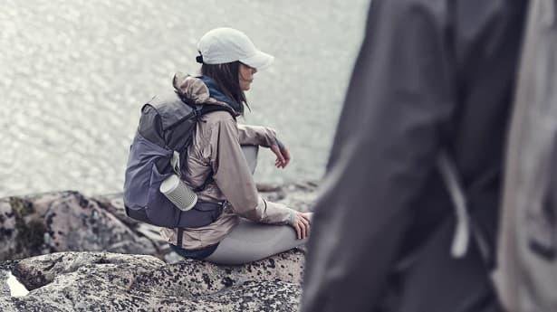 hiker sitting on rock