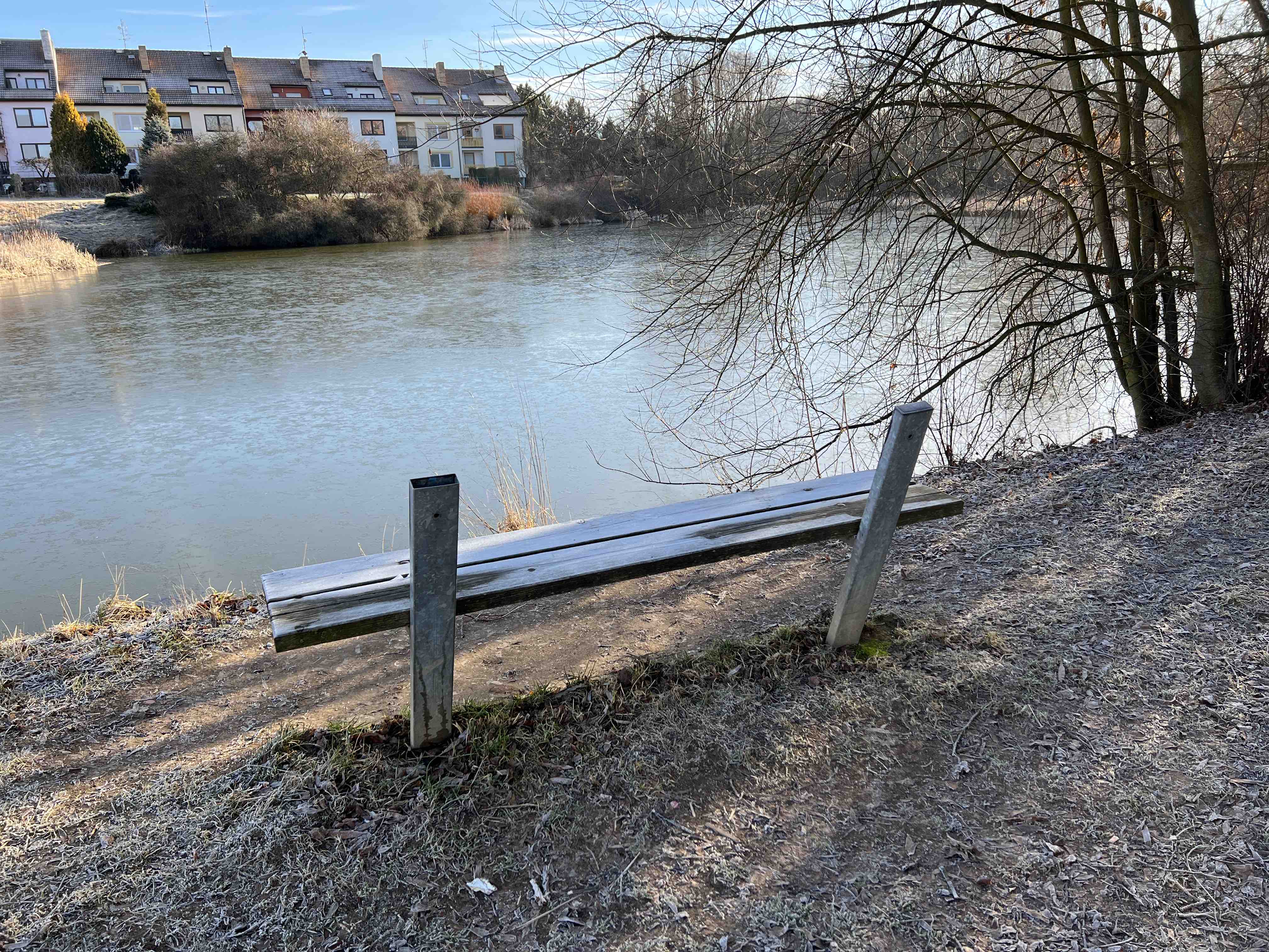 bench by lake winter