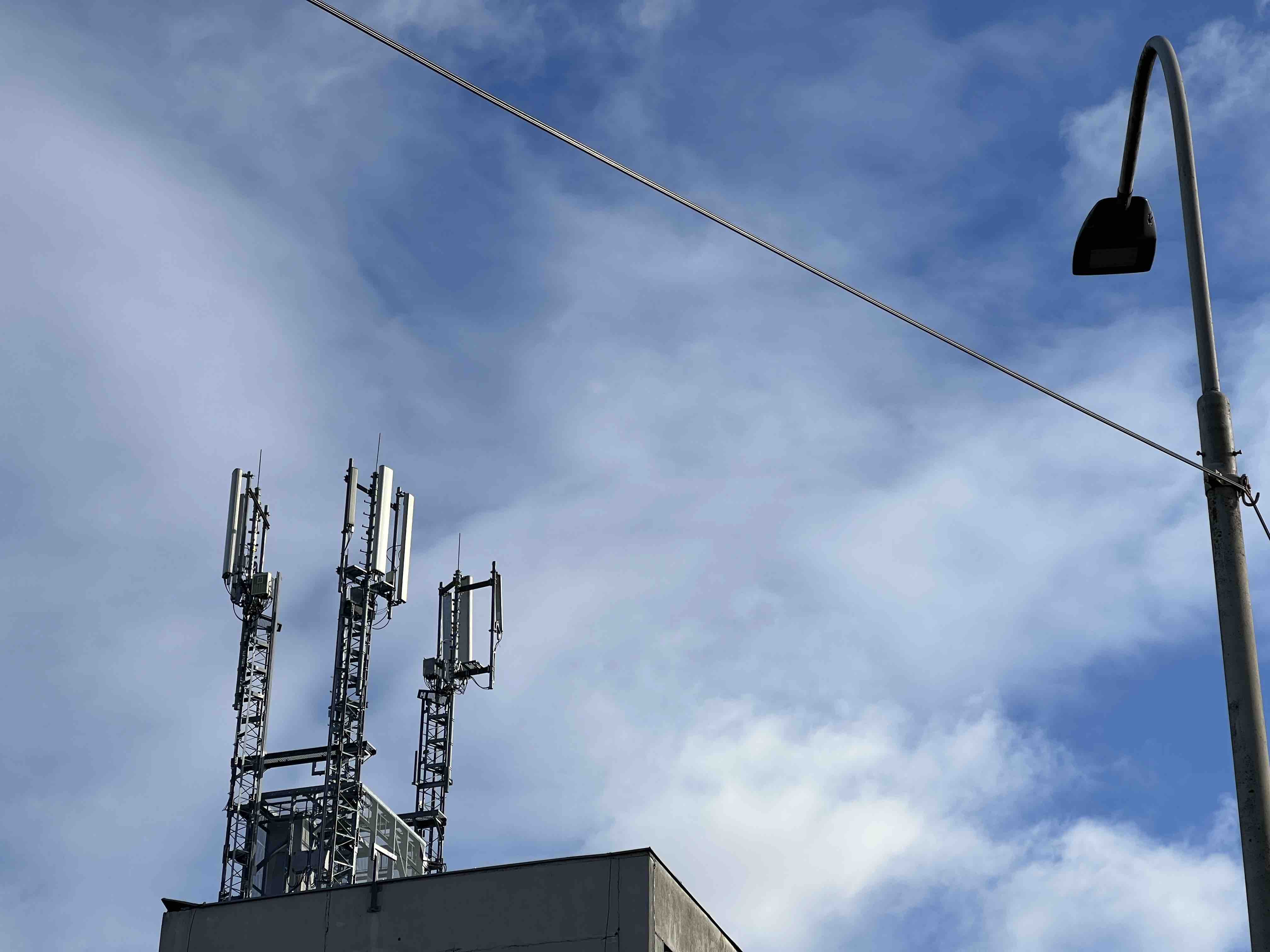 cell tower and streetlight