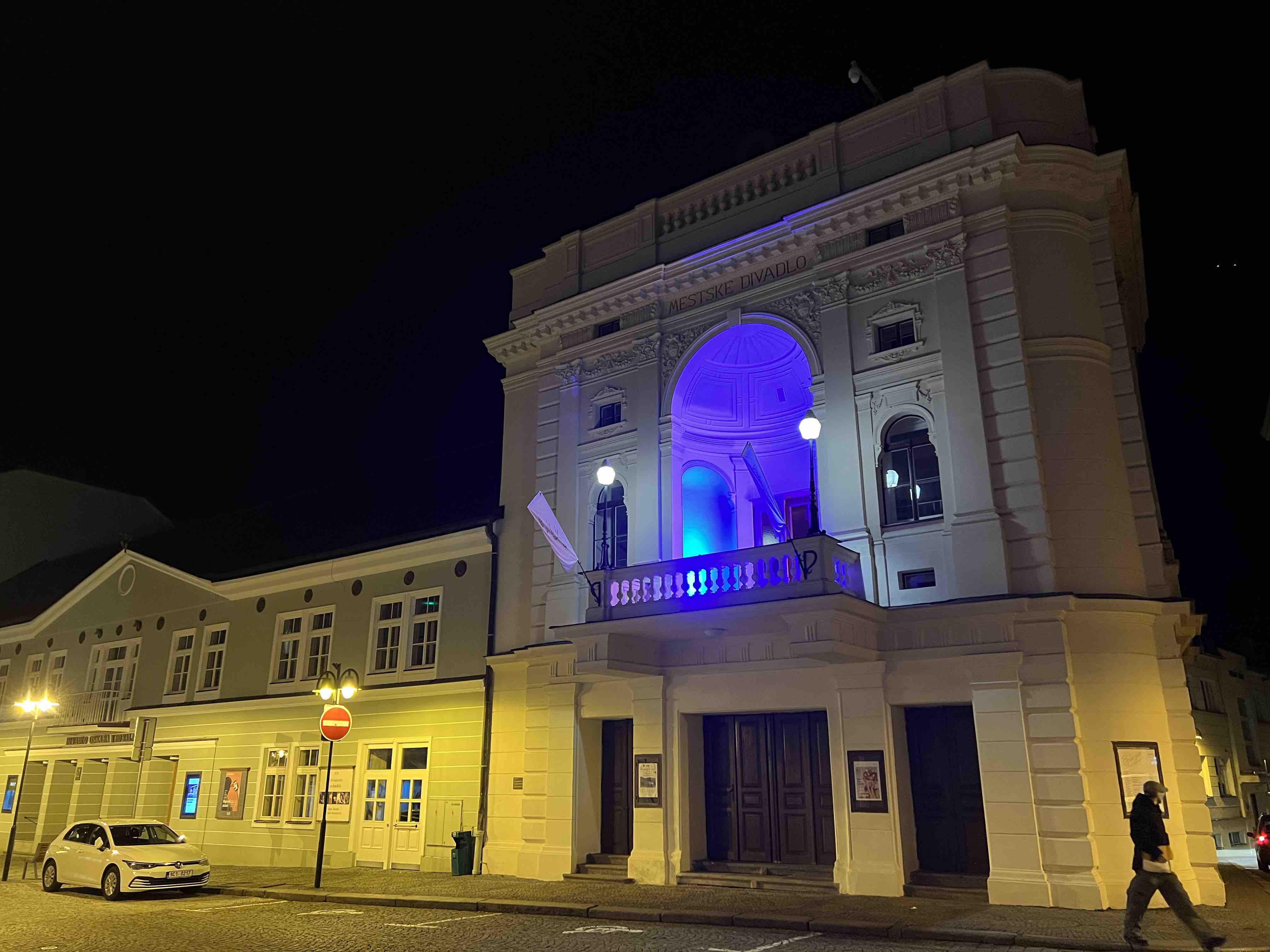 illuminated theater building at night