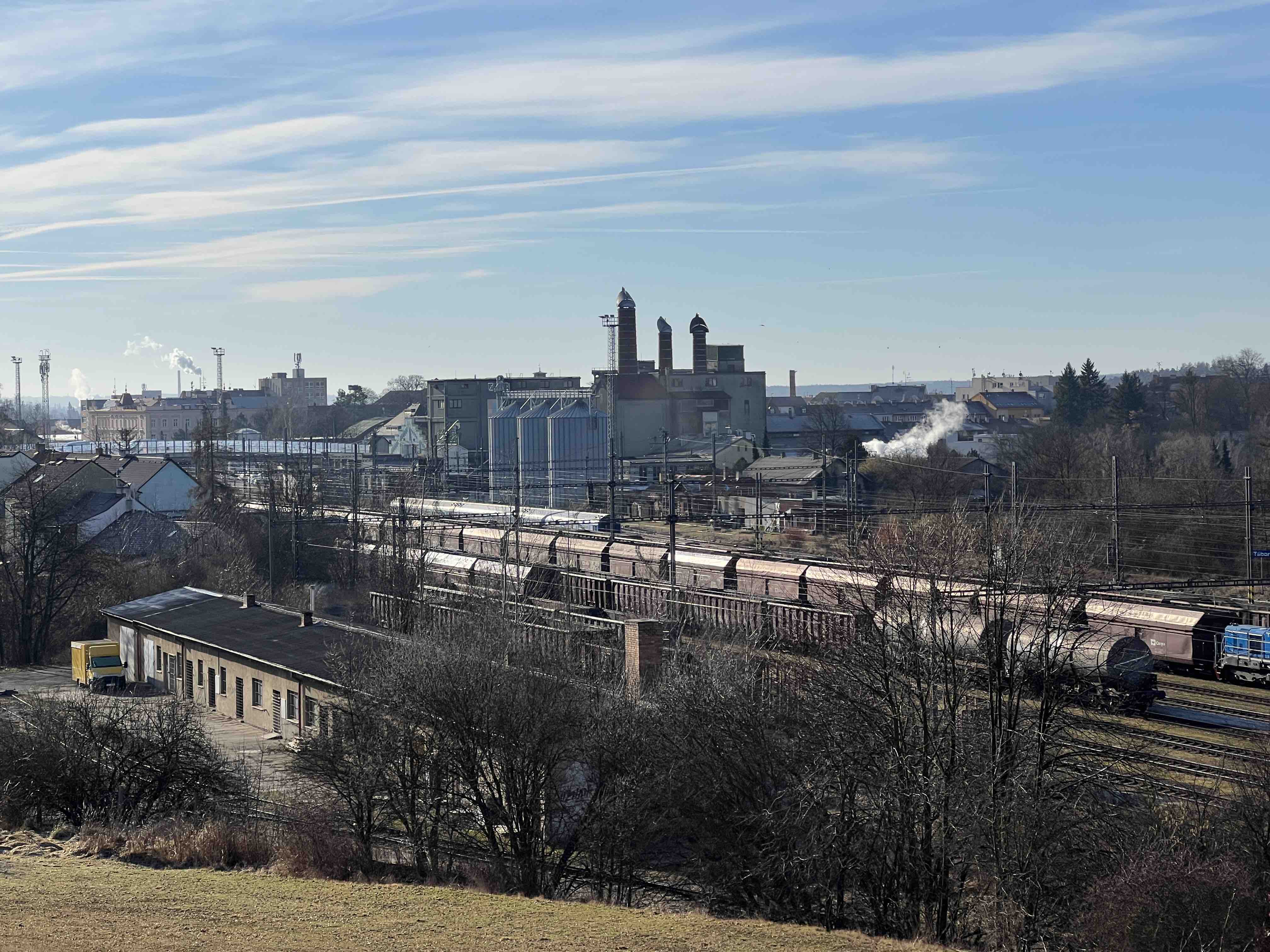 industrial buildings and train tracks